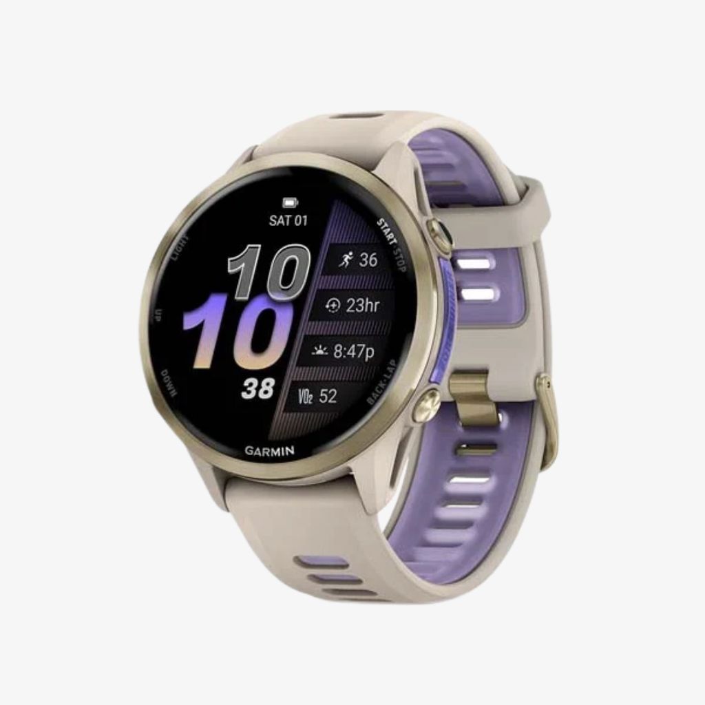Forerunner® 970, Soft Gold Titanium with French Grey Case and French Grey/Translucent Indigo Band - Image 1